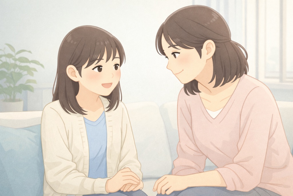 反抗期の子どもと母親が落ち着いて向き合い会話する場面。